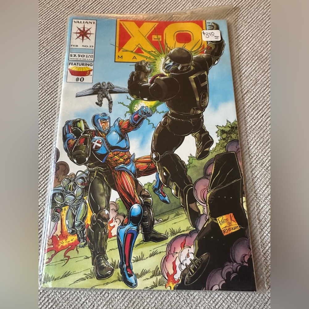 X-O Manowar Comic Book Featuring Blue and Red Hero